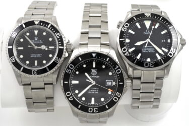 3 watches on white background